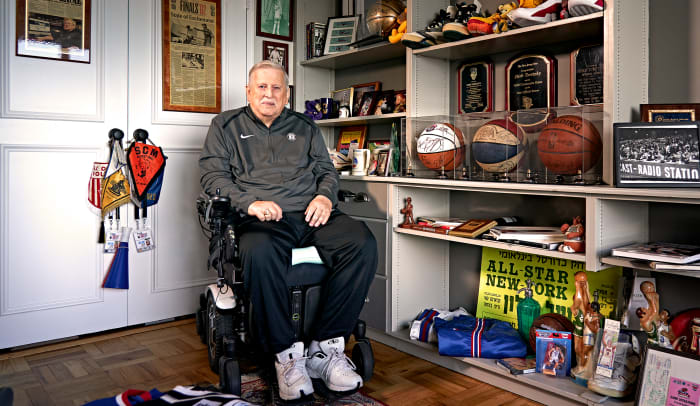 TEAM PLAYER Turetzky, who has been on the job courtside for 54 years, keeps a shrine to the Nets in his apartment.